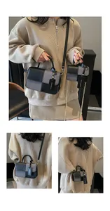 Detail showing two sizes of contrast stitching crossbody bags with leather and woven textures
