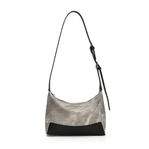 Retro patchwork shoulder bag with grey marble pattern and adjustable black leather strap