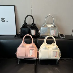 Fashionable Boston shoulder bags in black, silver, pink, and white with card slots