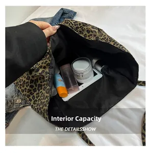 Spacious interior of the leopard print canvas tote bag showing storage capacity