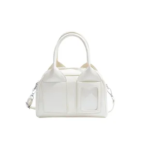 Cream white PU leather shoulder bag with unique flap design and silver hardware details