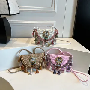 Bohemian woven crossbody bags with tassels and beads in beige, khaki, and pink colors