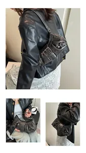 Detailed views of grey vintage leather shoulder bag with metallic buckle and zipper