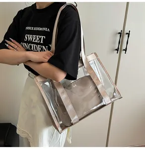 Detailed view of the 2-in-1 clear PVC beach tote with beige fabric inner pouch