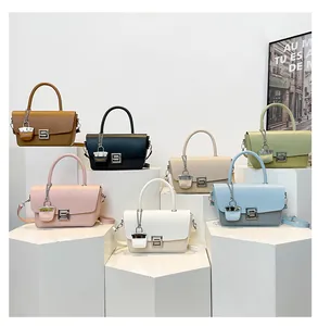 Detailed display of vintage shoulder bags in various colors with metallic square buckles