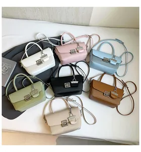 Flat lay of vintage crossbody bags in seven colors with leather and woven textures