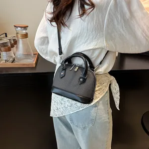 Chic woven shell bag for women with black leather trim and silver dual zippers