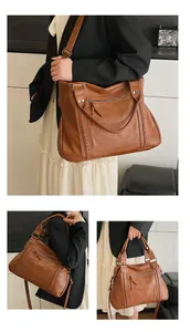 Detail view of brown vintage tote bag with woven lines and large capacity layout
