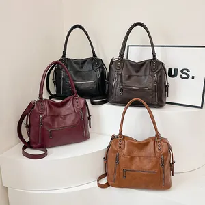 Set di borse tote retrò capienti in quattro colori con tasche multiple a cerniera