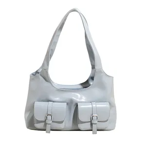 Retro light blue patent leather shoulder bag with double front pockets and silver buckles