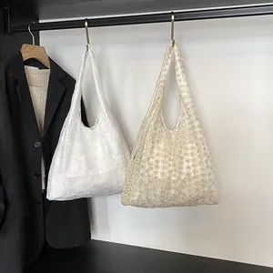 Floral embroidered mesh tote bags in white and beige with delicate lace texture