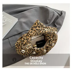 Leopard print tote bag showing daily capacity for phone, perfume and lipstick
