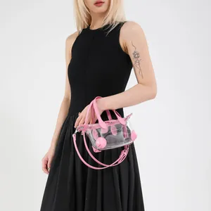 Rosa Strandtasche aus klarem PVC mit Ledergriffen für den Sommer-Style