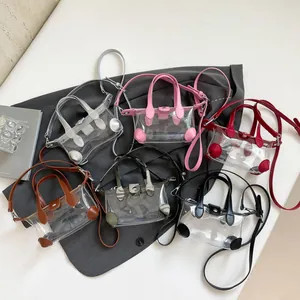 Transparente PVC-Eimertaschen in sechs Farben mit Ledergriffen und Umhängeriemen
