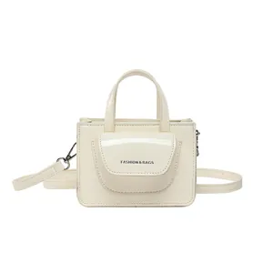 Cream PU leather crossbody chain bag with top handle and Fashion & Bags text