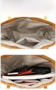Interior detail of large tote bag showing zipper pocket and spacious main compartment