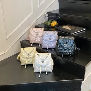 Mini zaini in pelle PU trapuntata a stella in cinque colori con manici a catena