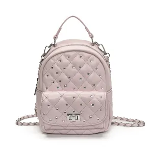 Mini zaino trapuntato rosa con strass e spallacci a catena in metallo argento