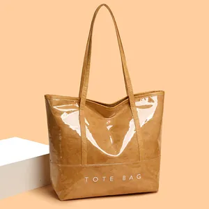 Fashion vintage glossy caramel tote bag with TOTE BAG lettering and long handles