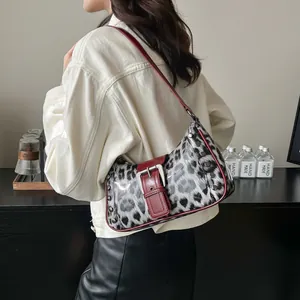 Retro leopard print underarm bag with red leather trim and silver studs for women