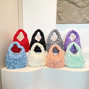 Pleated cloud ruffle handbag in eight colors with silky textured finish and elegant design