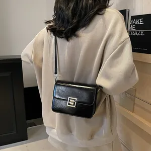 Chic black glossy leather crossbody square bag with silver metal geometric buckle