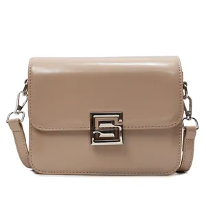 Minimalist beige glossy leather flap crossbody bag with square silver metal buckle