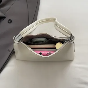 Large capacity cream white PU leather tote bag showing spacious interior and pockets