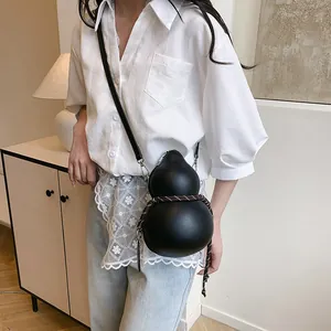 Unique gourd-shaped black leather crossbody bag with decorative woven rope strap