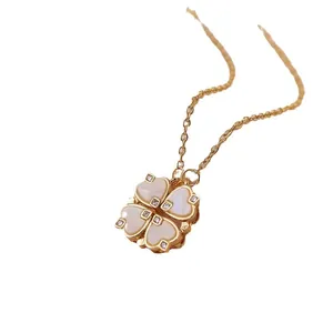 Collana convertibile in oro 18K con quadrifoglio a cuore, conchiglia bianca e cristalli