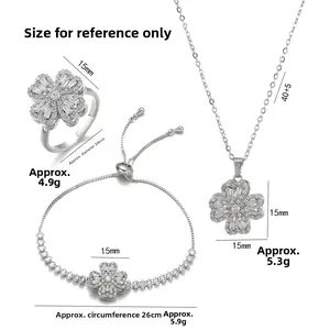 Three-piece jewelry set with clover pendants including ring, necklace, and bracelet