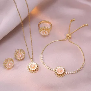 Parure bijoux fleur dorée avec collier marguerite, boucles d'oreilles et bague