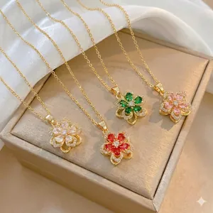 Rotating floral zircon pendant necklaces in four colors with gold plated titanium steel chain