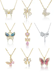 Detailed collection of nine distinct bow and butterfly pendant necklaces in 3x3 grid