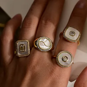 Gold adjustable shell rings with heart and geometric shapes and sparkling zircon accents