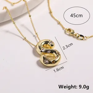 Gold plated 3D letter S necklace with clear zircon stones on a beaded chain