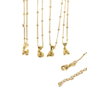 Polished 18K gold plated bubble letter pendants on adjustable satellite chain necklace
