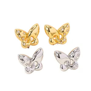 Orecchini a farfalla placcati oro 18K con zirconi a stella in tonalità oro e argento