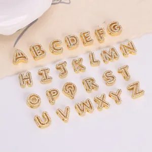 26 gold-plated copper alphabet charms with pavé cubic zirconia for DIY jewelry making
