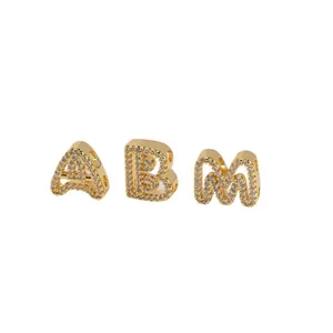 Gold-plated copper alphabet charms A, B, and M with cubic zirconia for DIY jewelry