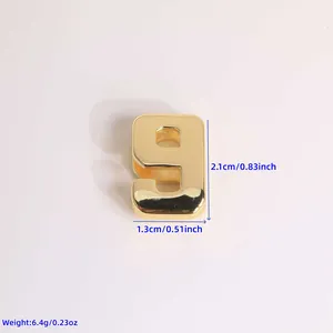 Detailed size view of an 18K gold plated number 9 pendant with 2.1cm height and weight specs