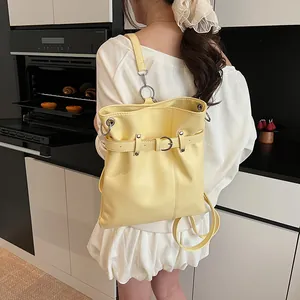 Minimalist yellow PU leather shoulder bag with buckle detail and silver rings