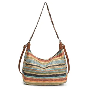 Rainbow woven straw tote bag with multi-color stripes and adjustable leather chain strap