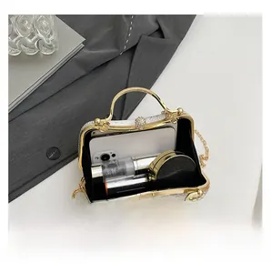Detail view of the luxury rhinestone evening bag showing interior capacity for essentials