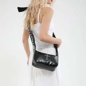 Black Y2K gothic crossbody bag with silver cross, studs and bow detailing