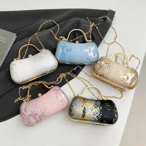 Snakeskin embossed clutch bags with elegant gold handles and pearl clasps in five colors