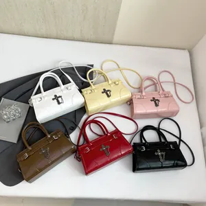 Collection of retro high-capacity crossbody bags with metal cross in six stylish colors