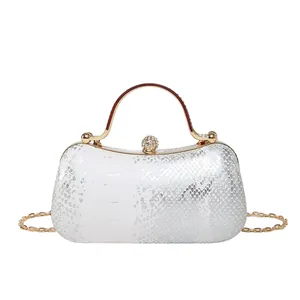 Elegant white snake pattern clutch with sparkling handle and diamond sphere clasp for women