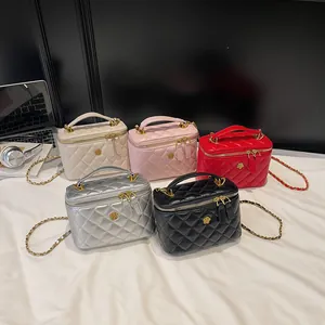 Chic quilted crossbody chain bags in five colors with a camellia logo and top handle