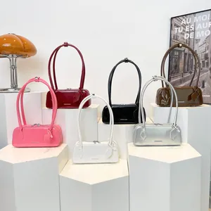 French minimalist glossy shoulder bags in various colors displayed on white pedestals